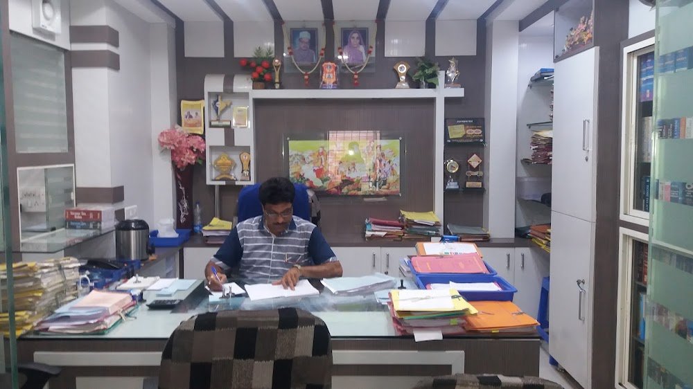 Rajendra Shah(TAX CONSULTANT)