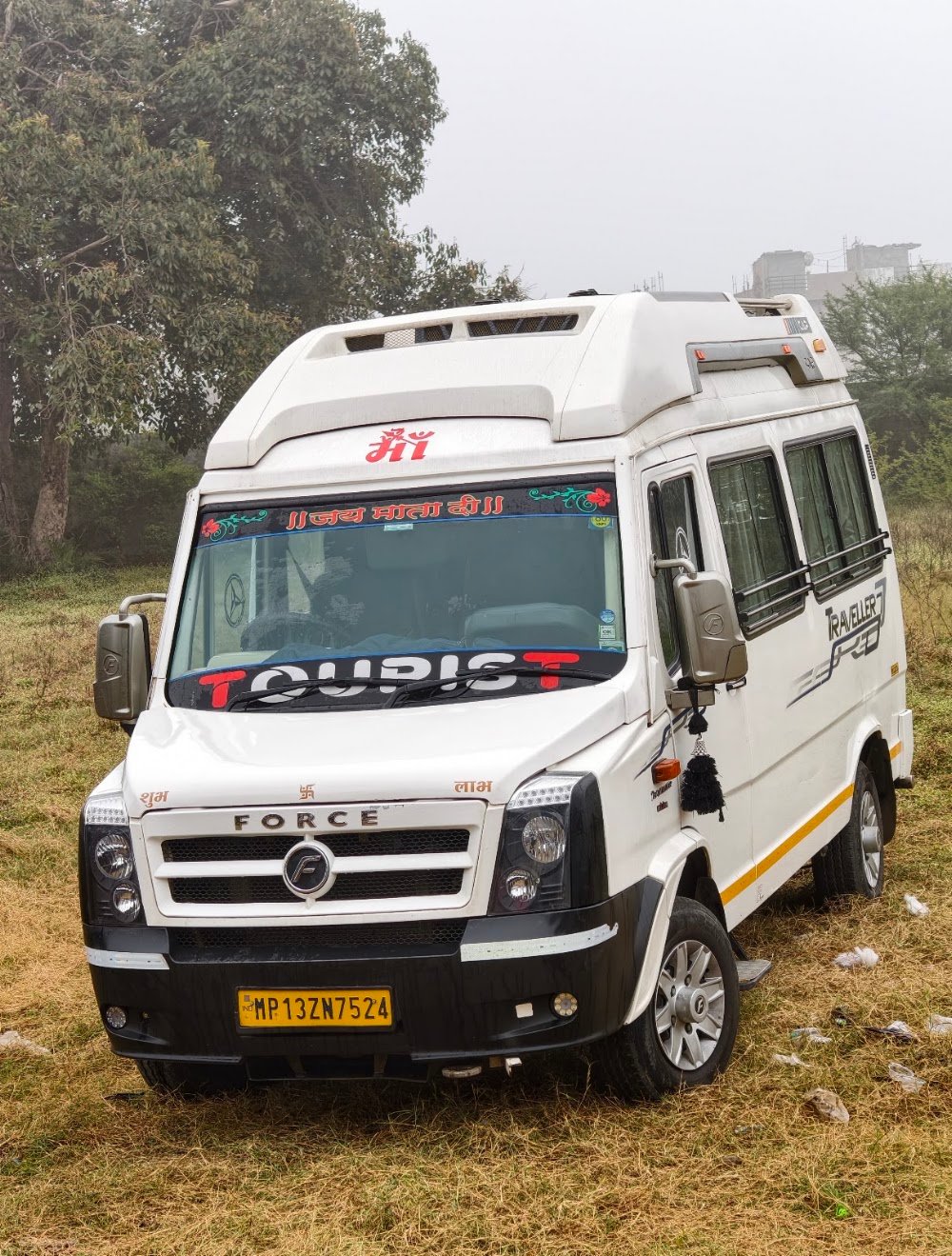 Nikita travels ujjain taxi service (tampo traveller on rent)